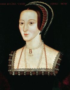 安妮·博林（1500—1536）。当代少有安妮的肖像，这幅肖像是从一个更早的版本中衍生而来的。她戴着一个因她而在宫廷流行的法国头饰，还戴着那个有名的字母“B”吊坠。