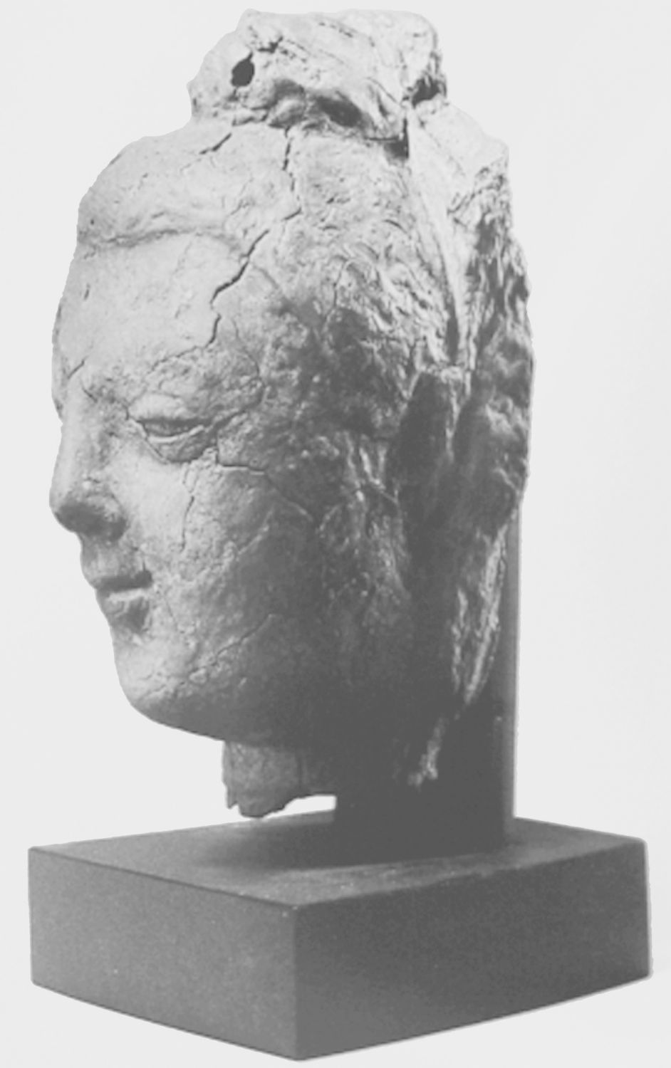图1-57 释迦牟尼头部造像 于阗热瓦克佛寺遗址出土 大英博物馆藏