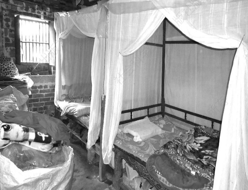 图1-4 壮乡窄小卧室中的夫妻床