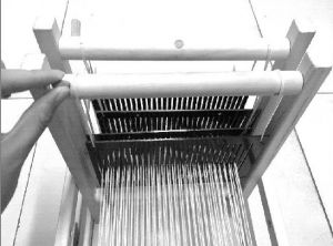 图2 纺织机抬综装置