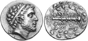 图2.4 公元前180年，佩拉或安菲波利斯（Amphipolis）铸造的2德拉克马银币上的腓力五世头像。注意他头上戴的简式王冠，那是自亚历山大大帝以来马其顿王权的象征。马其顿国王们声称，钱币上的权杖是他们从赫拉克勒斯（Heracles）那里继承来的。