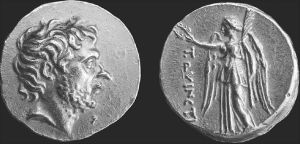 图5.2 一枚在希腊使用的极为罕见的金币，以T.昆克提乌斯·弗拉米尼努斯的名字命名。请注意，这里的拉丁铭文其实是一种文化统治的主张。这一时期的罗马人还不知道把自己的头像放在钱币上通常为神或国王保留的位置。